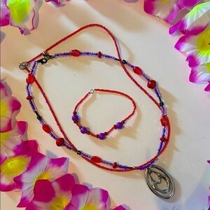 Vibrant Red and Purple Beaded Necklace with Silver Pendant